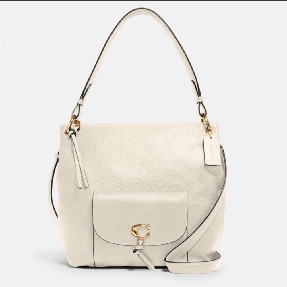 Brand new in packaging!  Coach purse.